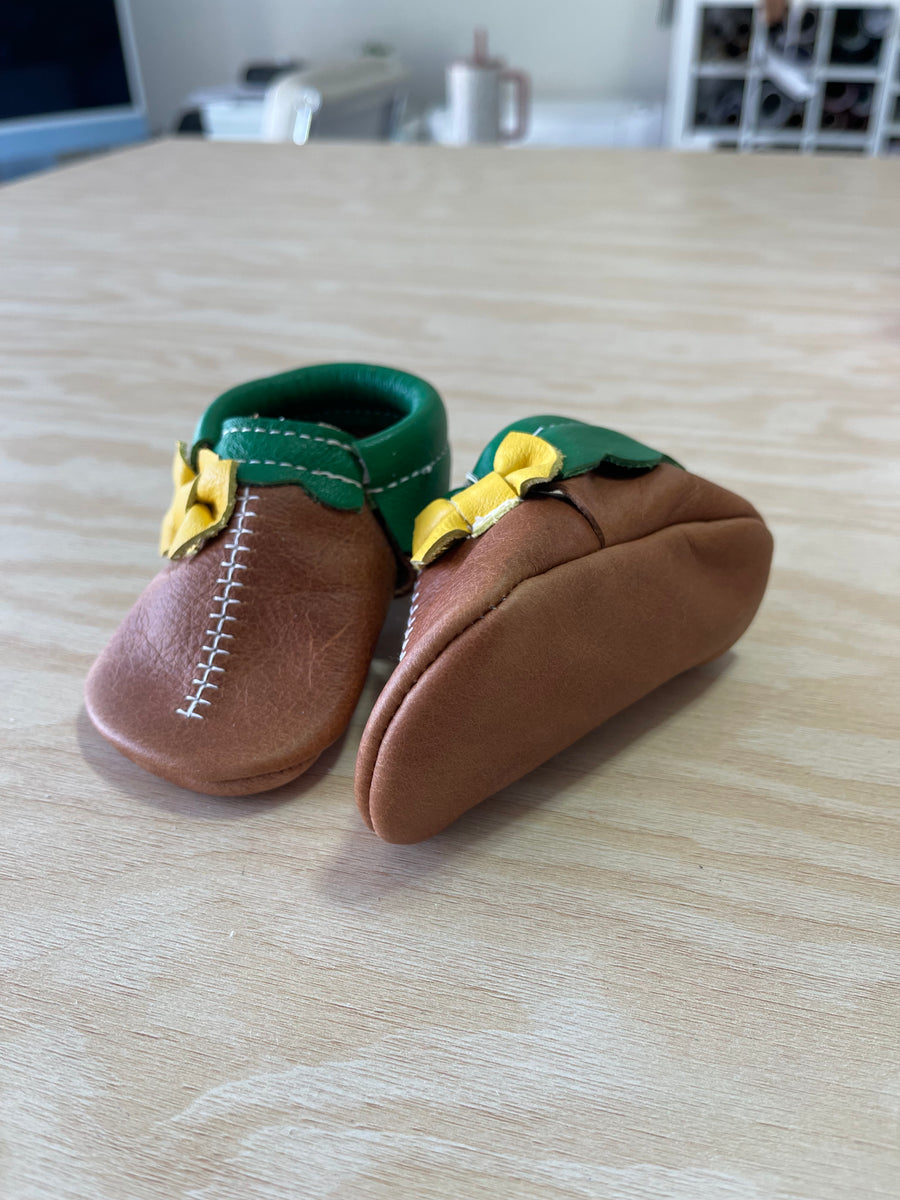 Football Side Bow Moccs Size 2